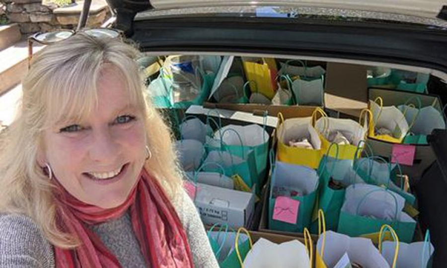Jill Woodley, Seniors&#039; Community Services marketing and communications specialist, shows off her trunk full of soup and handcrafted bowls ready for delivery as part of the organization&#039;s Soup &amp; Go fundraiser May 27